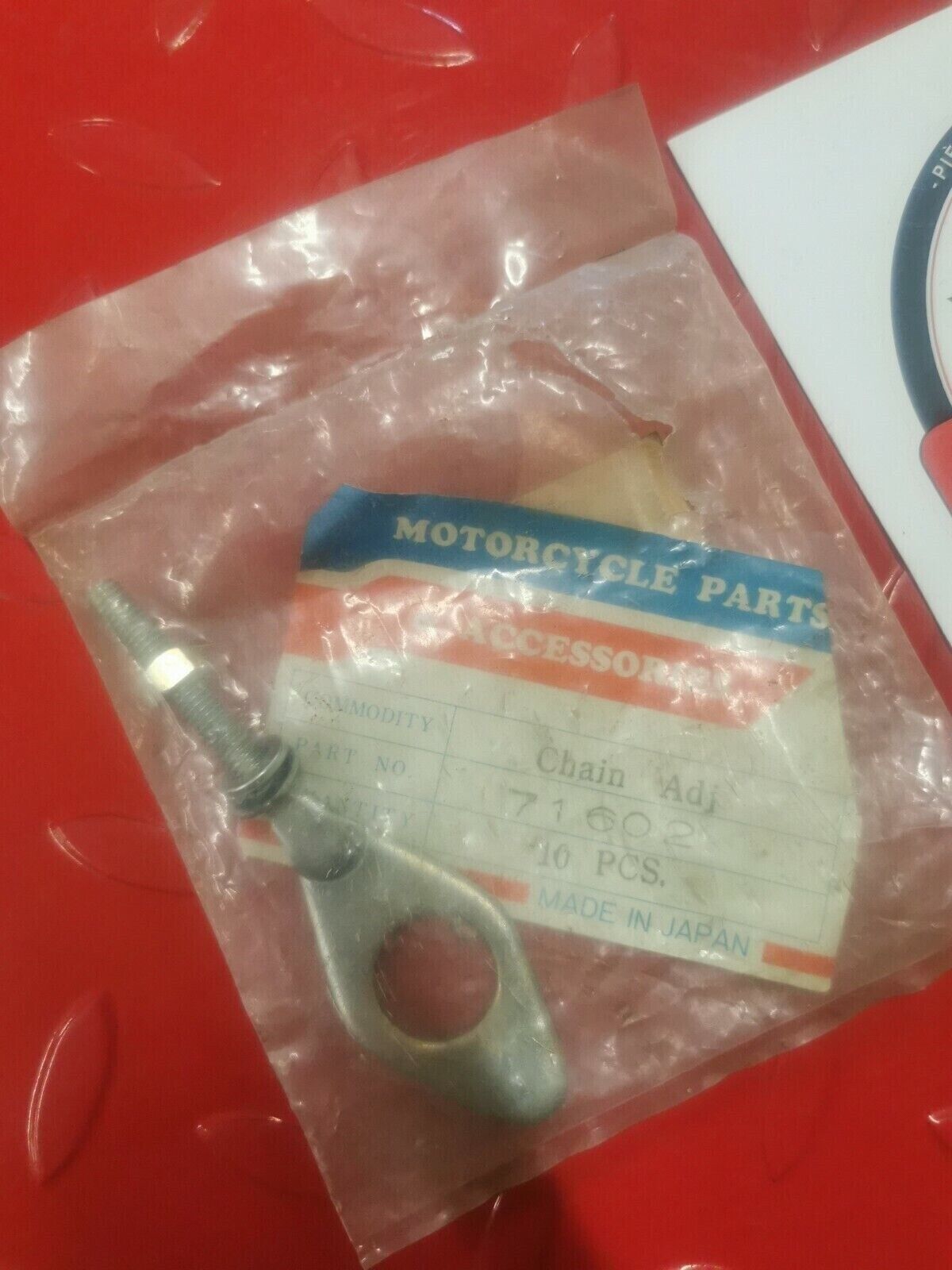 NOS Honda C50 left side drive chain adjuster 40544-041-000 H3
