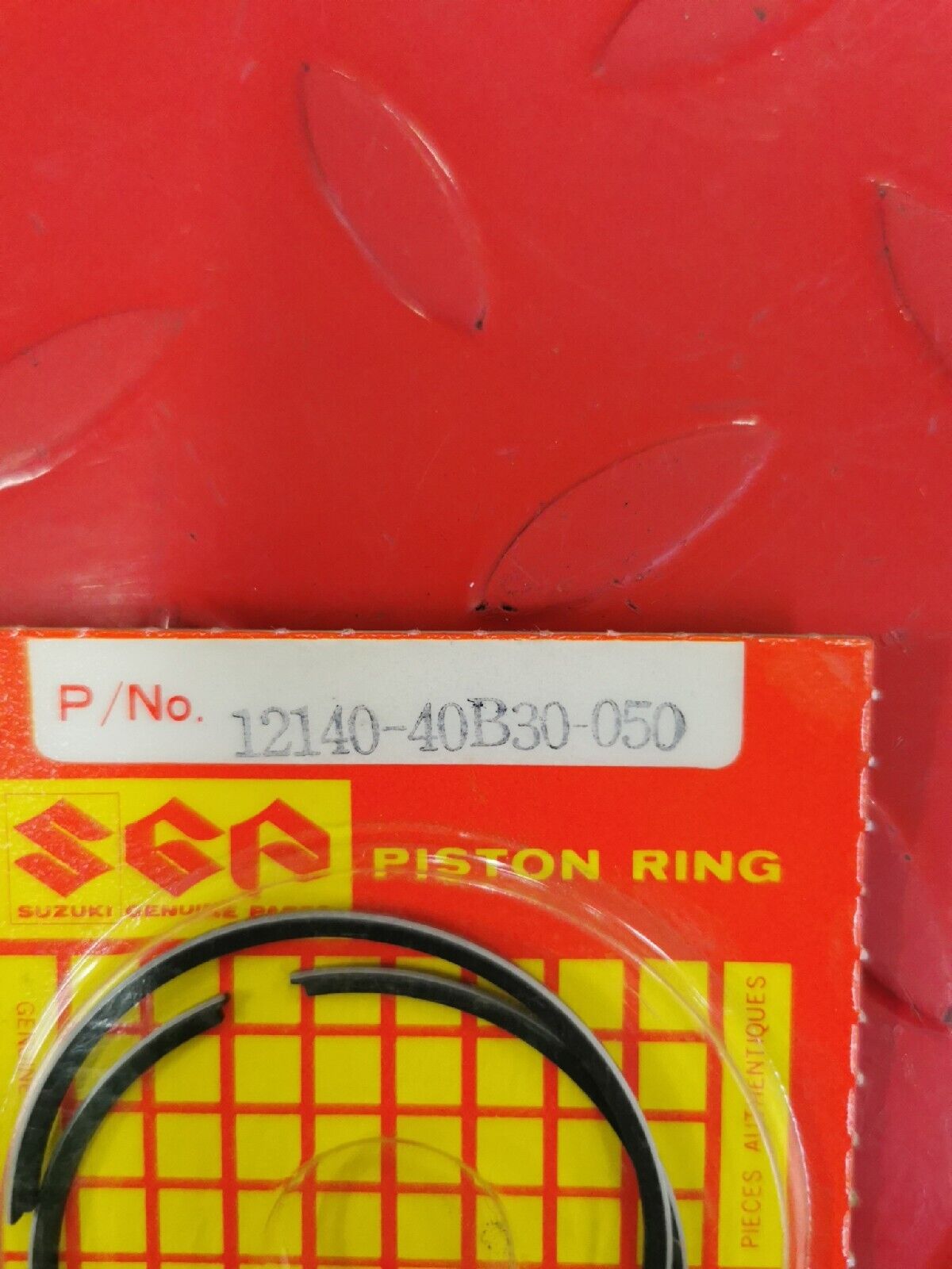 NOS SUZUKI LT80 2002 2003 2004 2005 2006 RING SET OS 0.5 12140-40B30-050 S11