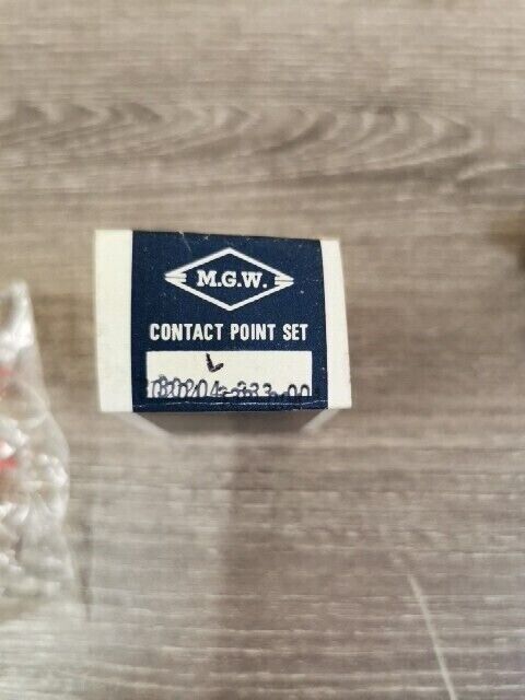 NOS MGW HONDA CB350 F CB400 LEFT  IGNITION CONTACT POINTS 30204-333-004 J60