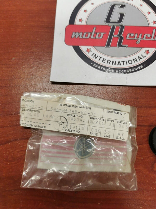 NOS Yamaha HEADLIGHT DAMPER 584-84345-60-00 Y69