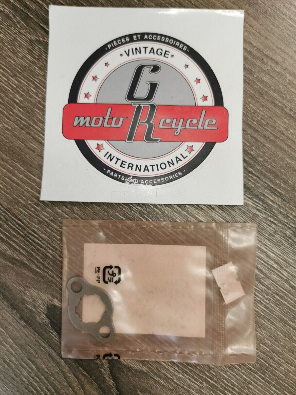 NOS HONDA PLATE 23802-040-000  H54