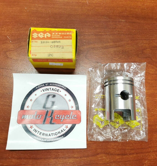 NOS Suzuki 1968 80K10 80K11 80K15 PISTON 1.0 12110-03710 S32