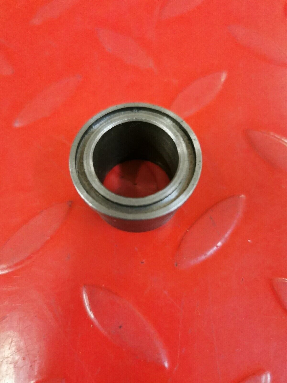 NOS HONDA CL77 1965  BUSHING A  SWINGARM PIVOT 52101-273-000 H38