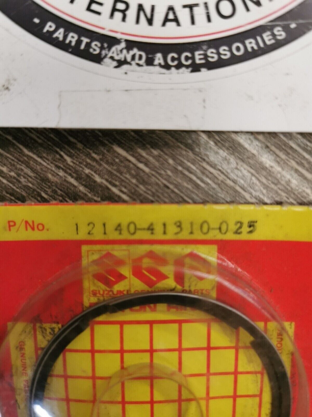 NOS SUZUKI RM125 1975 - 1980  RING SET PISTON O.25 12140-41310 S24