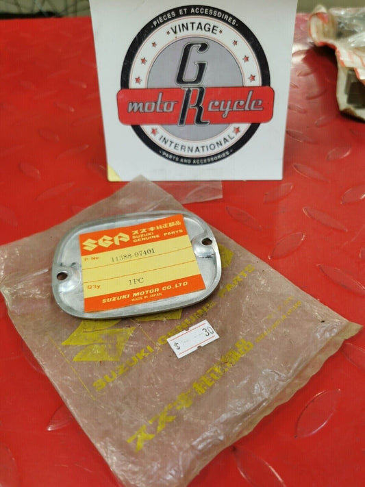 NOS SUZUKI  TC120 1971  REDUCTION ARM COVER   11388-07401 S12