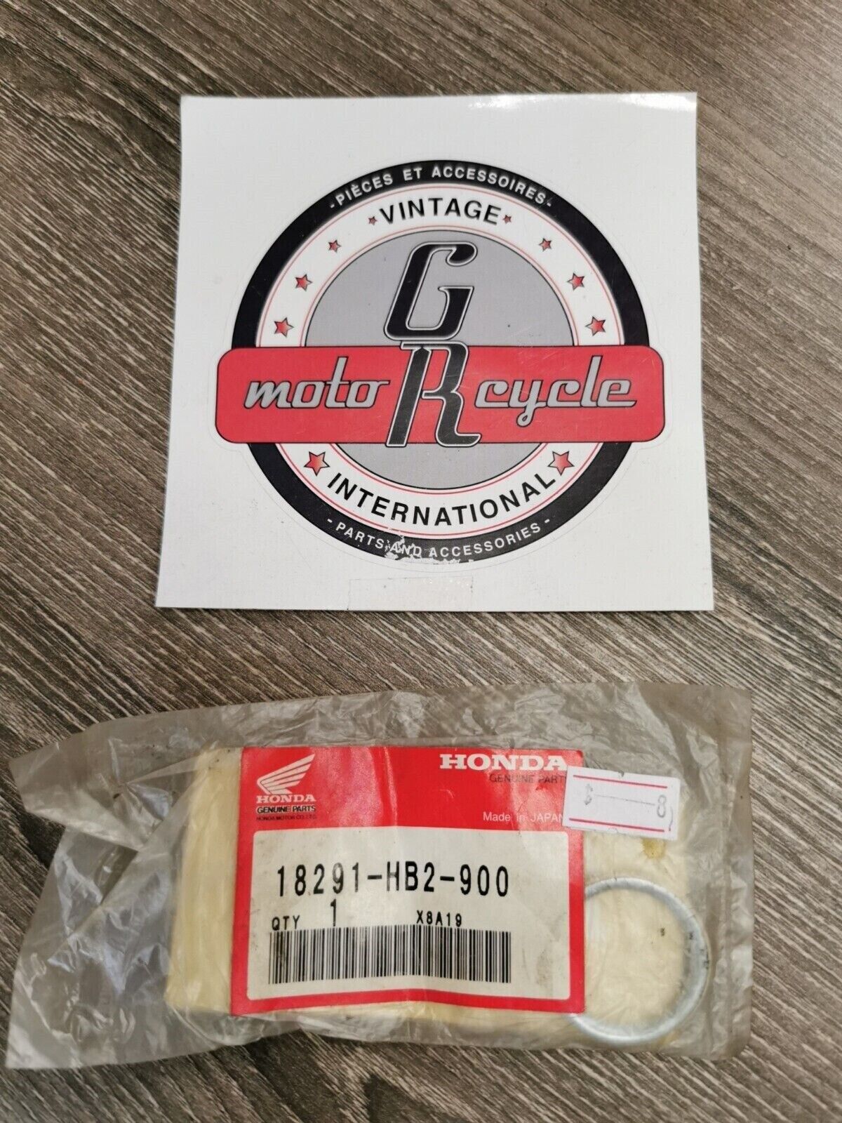 NOS HONDA CRF70F EXHAUST PIPE GASKET 18291-HB2-900 H54