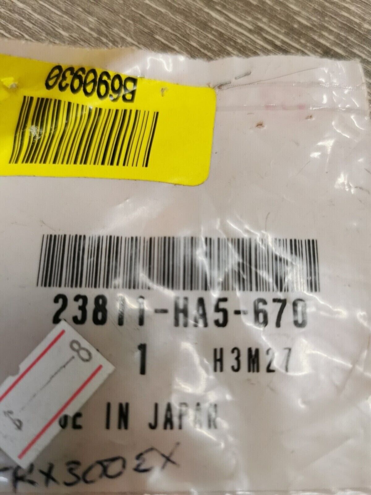 NOS HONDA FIXING PLATE 23811-HA5-670 H51