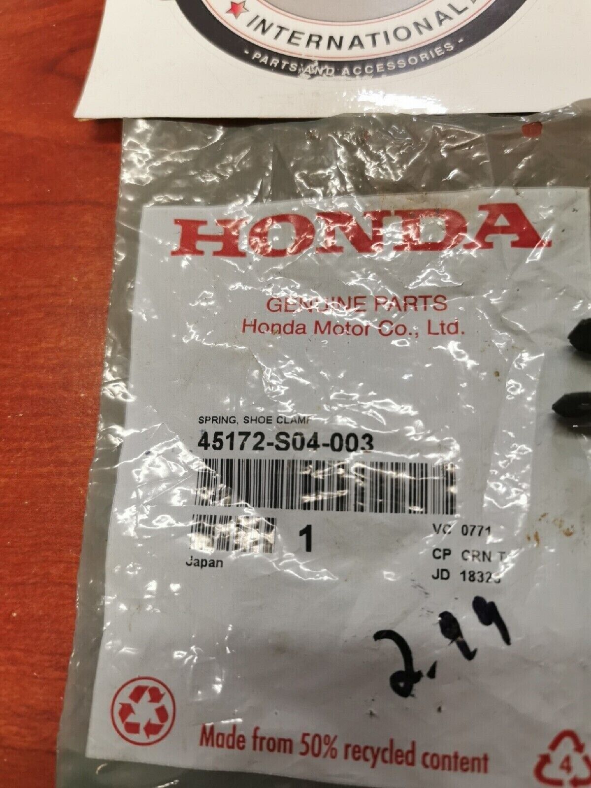 NOS Honda TRX350 TRX400 TRX300 SHOE CLAMP SPRING 45172-S04-003 H34