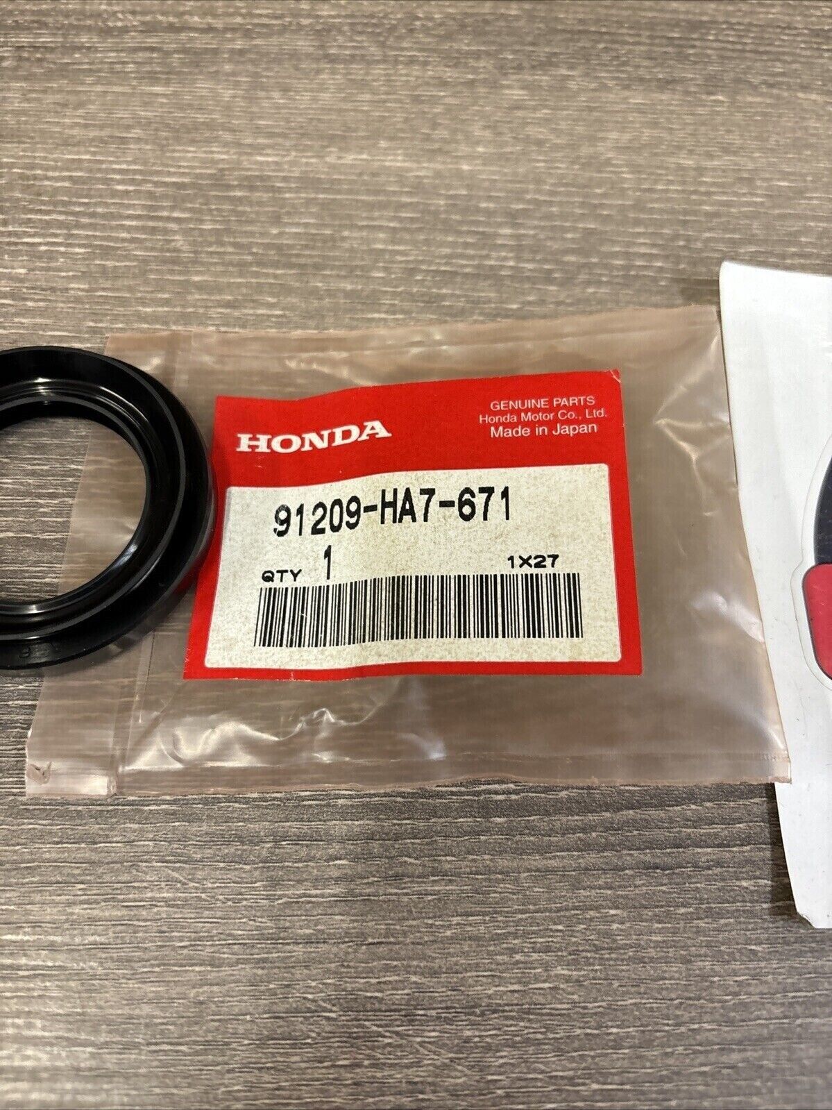 NOS Honda 1986 TRX350 DUST SEAL 36X56X7 91209-HA7-671 H128