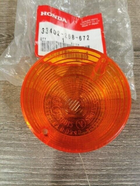 NEW NOS HONDA C70 C70M CB100 CB125S 1968 - 1979 LENS WINKER 33402-268-672 H102