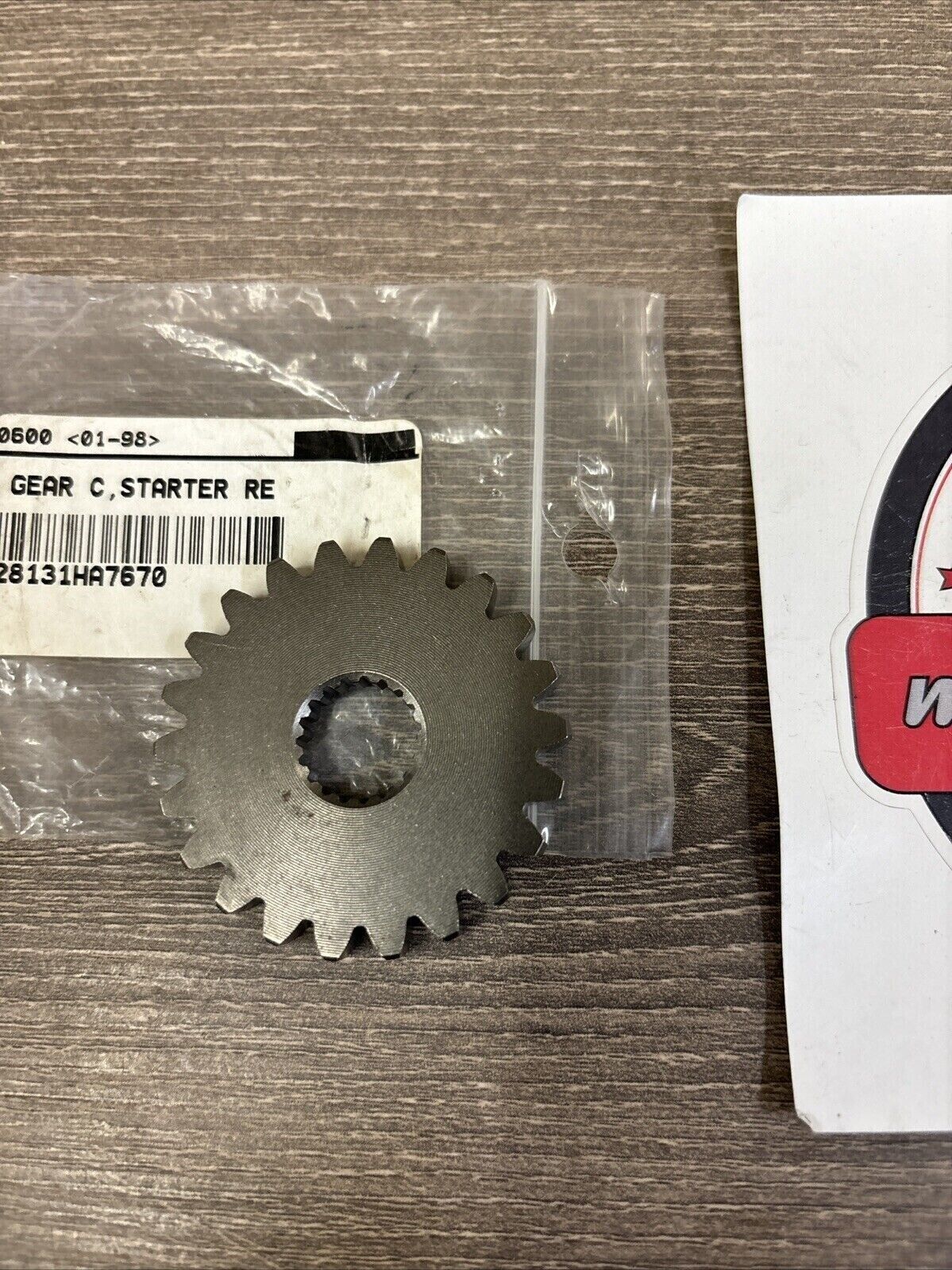 NOS Honda 1986 TRX350 STARTER REDUCTION GEAR C 22T 28131-HA7-670 H118