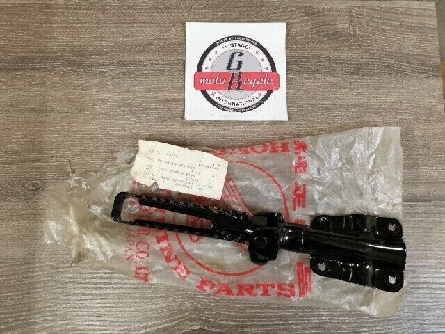 NOS HONDA ATC200E ATC200M 1982 - 1984 ARM  REAR STEP 50613-958-680 H74