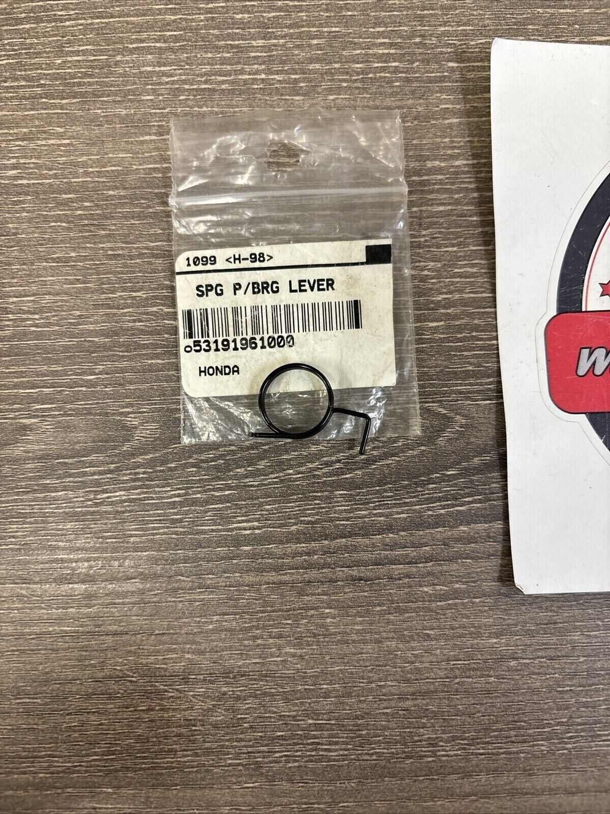 NOS Honda ATC110 ATC200E PARKING BRAKE CONTROL LEVER SPRING 53191-961-000 H124