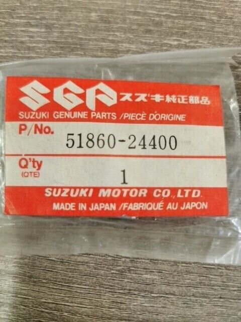 NOS SUZUKI LT185 LT250EF ALT185 LT250R PLATE HEADLAMP HOUSING 51860-24400 S39