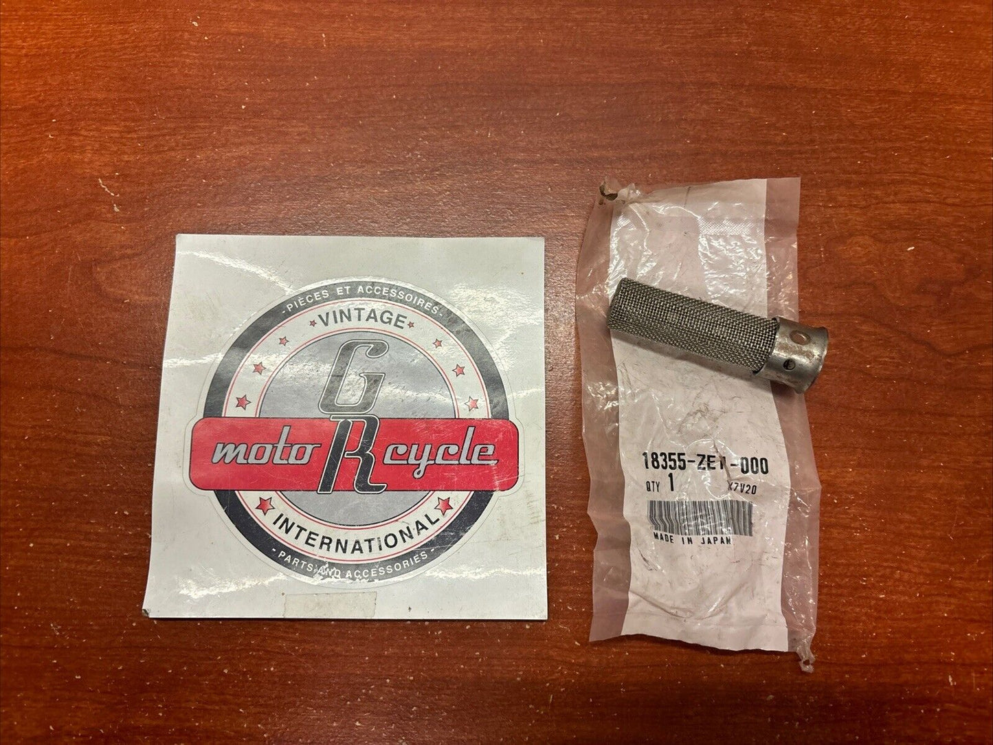 NOS Honda GX110 GX120 EB3000C FC600 SPARK ARRESTER 18355-ZE1-000 H184