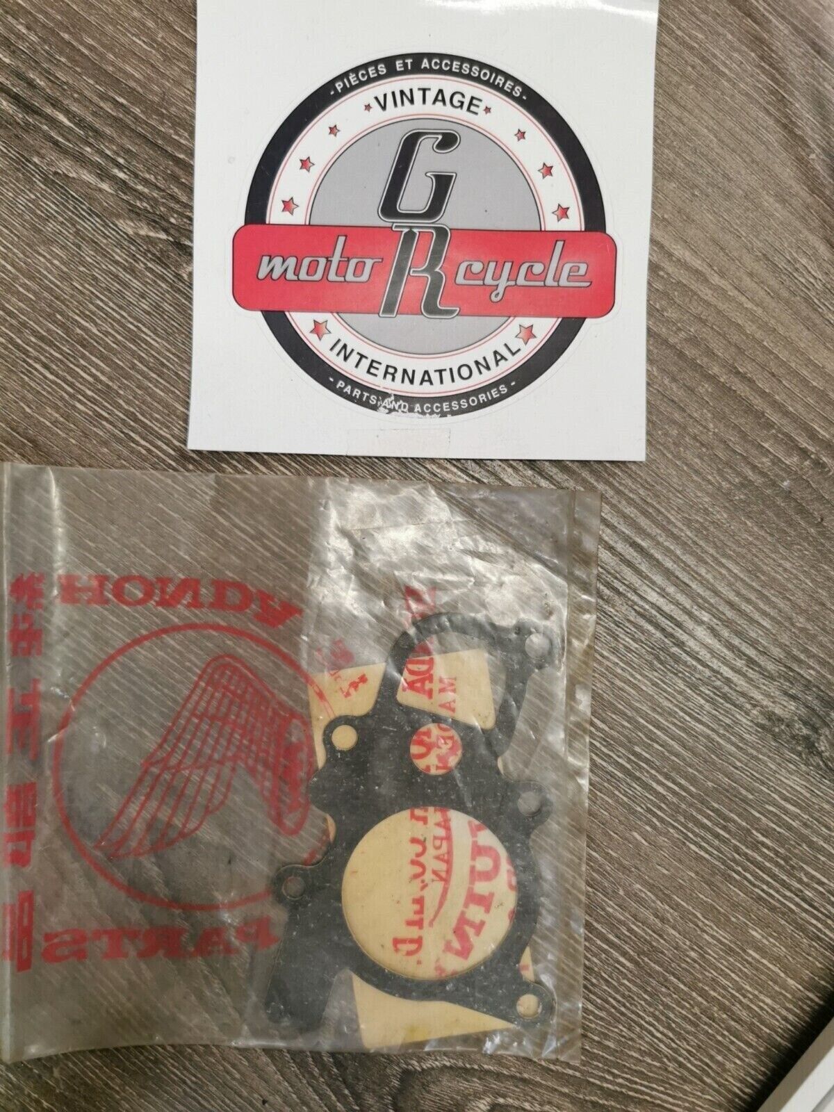NOS HONDA CR250 1984 GASKET EX MANIFOLD 18291-KA4-741 H49