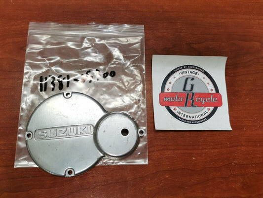 NOS SUZUKI 1973 - 1975 TS100 MAGNETO INSPECTION COVER CAP 11381-25300 S30
