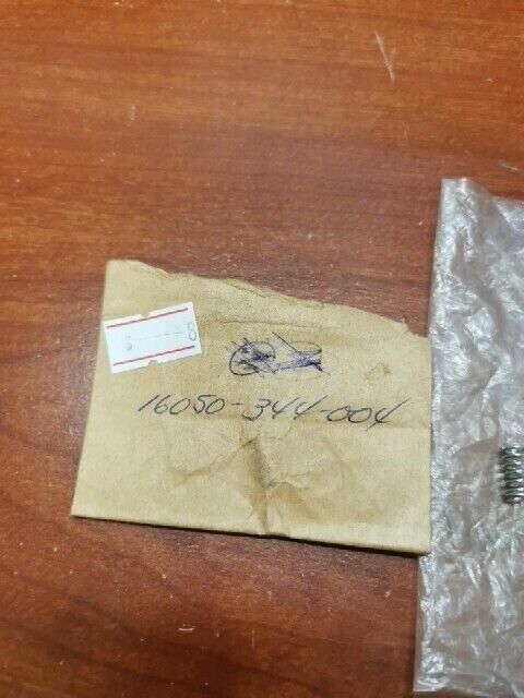 NOS Honda SCREW SPRING 16050-344-004 H90
