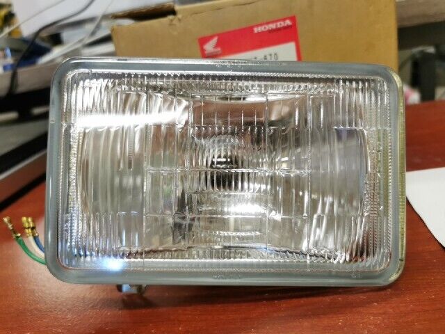 NOS Honda NX125 XL250R HEADLIGHT UNIT 33120-KY7-670 H107
