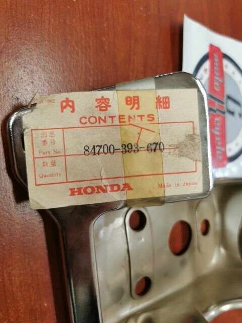 NOS Honda CB550/K CB650 CB750A/K7/K8 NUMBER PLATE BRACKET 84700-393-670 H69