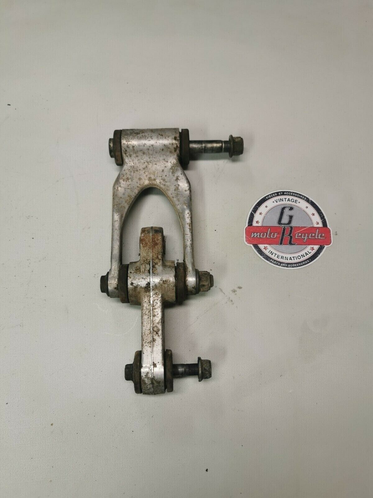 Suzuki RM125 1991 rear shock swingarm linkage dogbone cushion lever 62600-29810