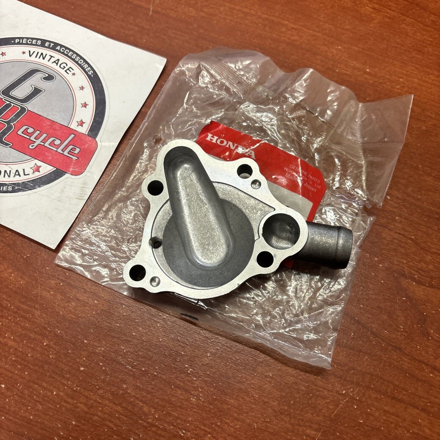 NOS Honda 1987 - 1994 CR125R WATER PUMP COVER 19221-KS6-700 H166