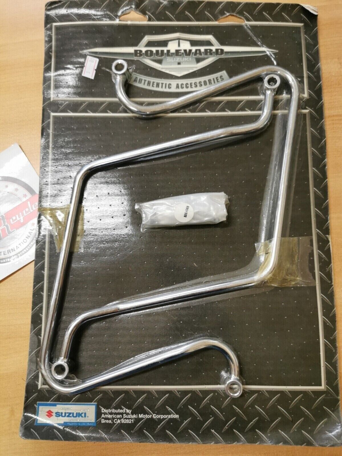 NOS  SUZUKI VL1500 2005 - 2009  SADDLEBAG SUPPORT  990A0-75015-001  S10