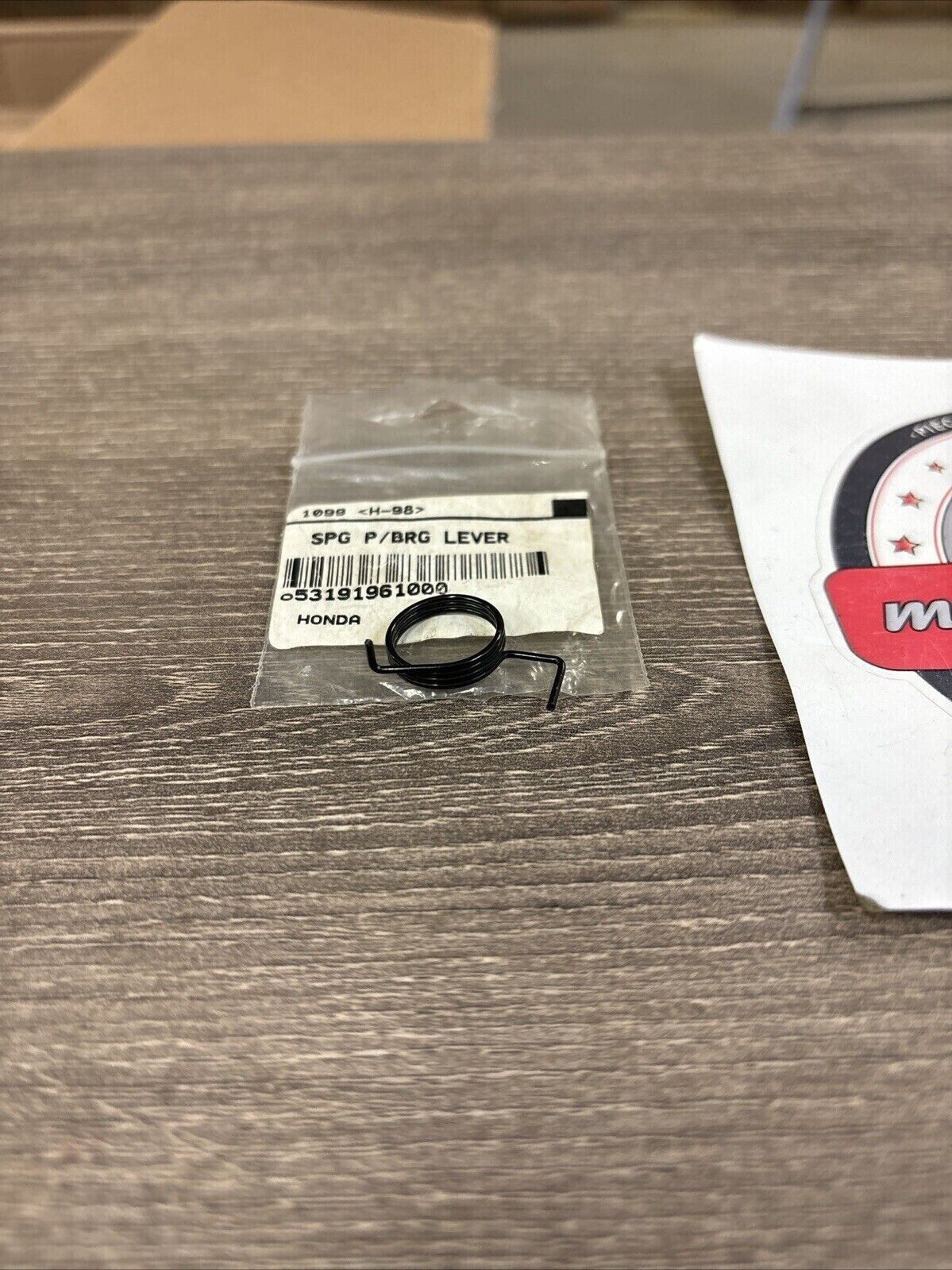 NOS Honda ATC110 ATC200E PARKING BRAKE CONTROL LEVER SPRING 53191-961-000 H124