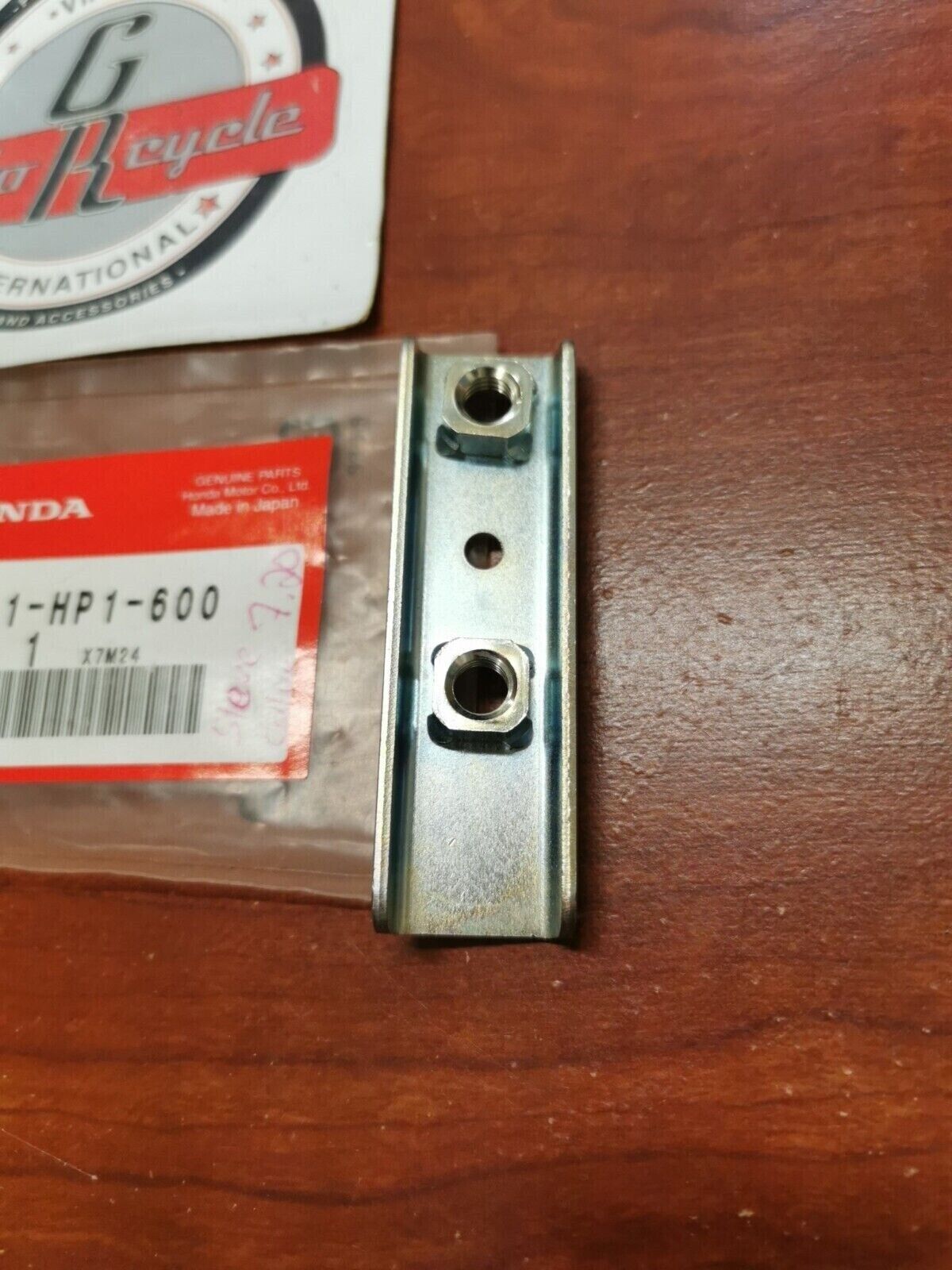 NOS Honda 2006 - 2009 TRX450R 12 - 14 TRX450ER CARRY PIPE STAY 50221-HP1-600 H64