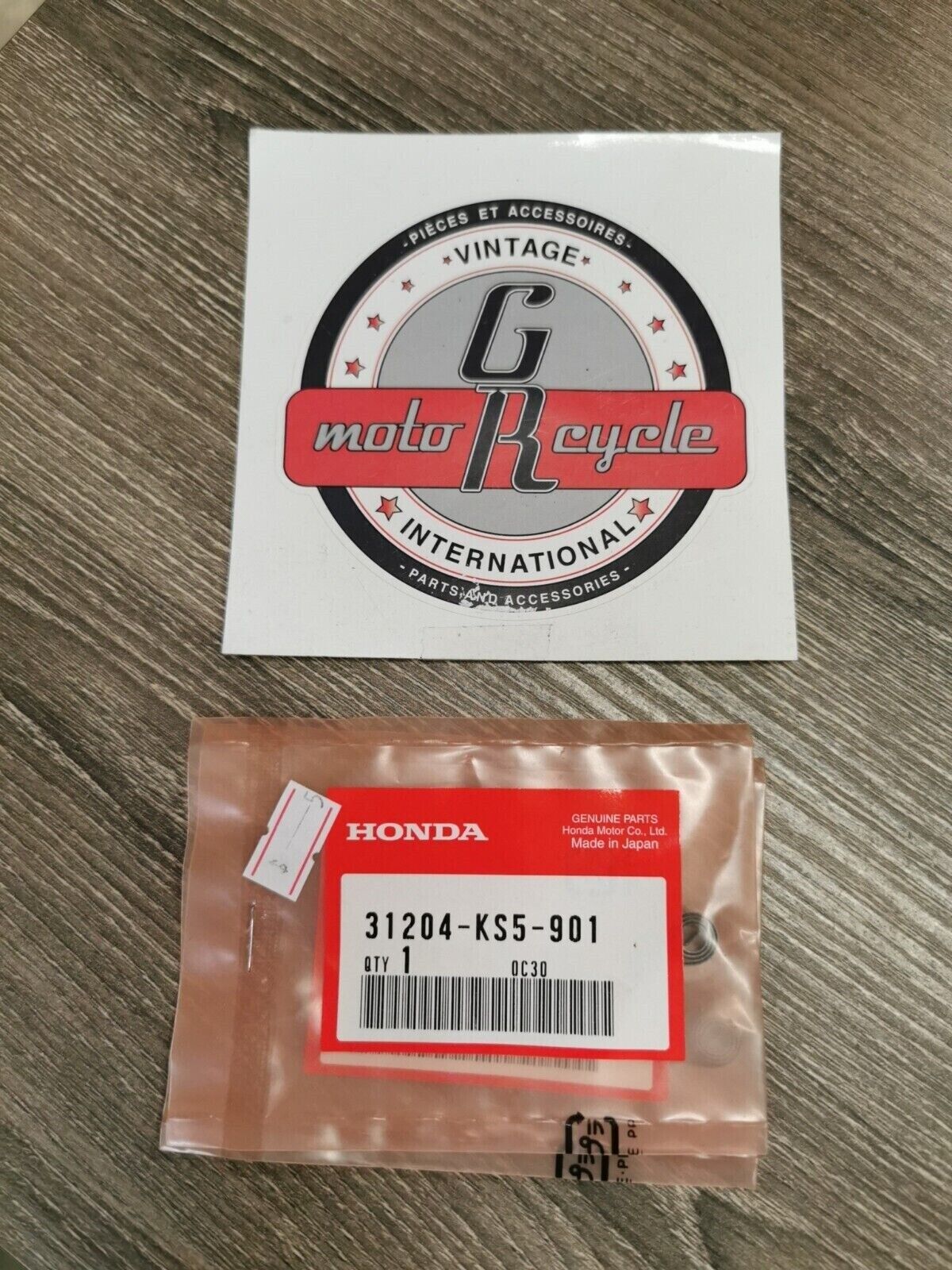 NOS HONDA  CARBON BRUSH SPRING 31204-KS5-901 H53