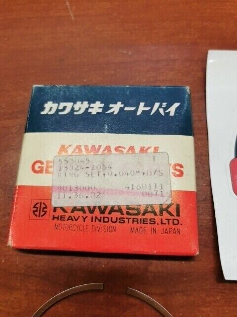 NOS Kawasaki 1987 1988 KLF300 PISTON RING SET (O/S 1.00MM)  13024-1064 K38