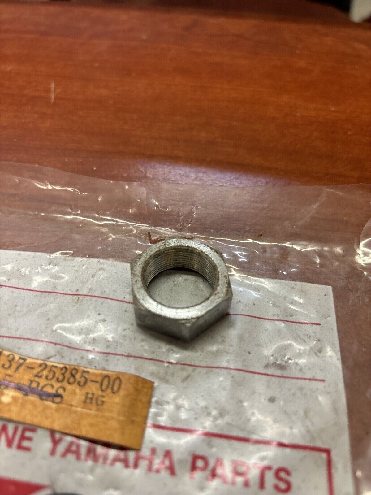 NOS Yamaha DT1 DT100 SPROCKET SHAFT NUT 137-25385-00-00 SUB 90170-20167-00 Y182