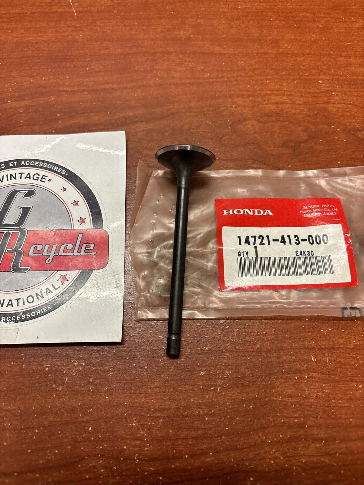 NOS Honda CB400N CB400T CB450 CM400 CM450 EXHAUST VALVE 14721-413-000 H169