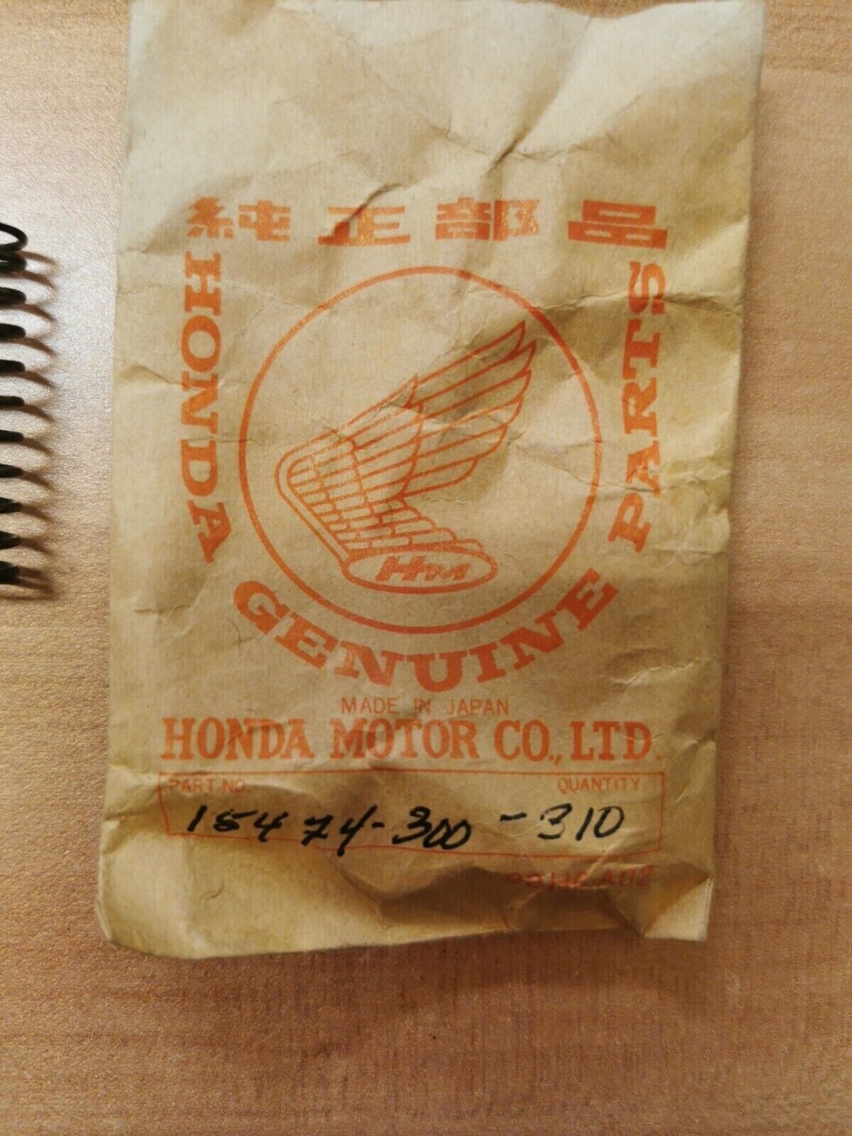 NOS Honda CB550 CB750 CB400 TRX500 TRX400 CHECK VALVE SPRING 15474-300-310 H26