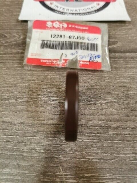 NOS SUZUKI LTA400 LT500F LTA500FC SEAL CRANKSHAFT UNDER OIL 12281-87J00 S54