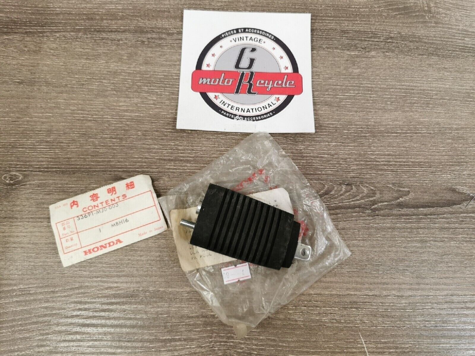 NOS HONDA VFR700F VF500F VR1100S  STAY  FR  TURN SIGNAL 33691-MJ0-003 H44