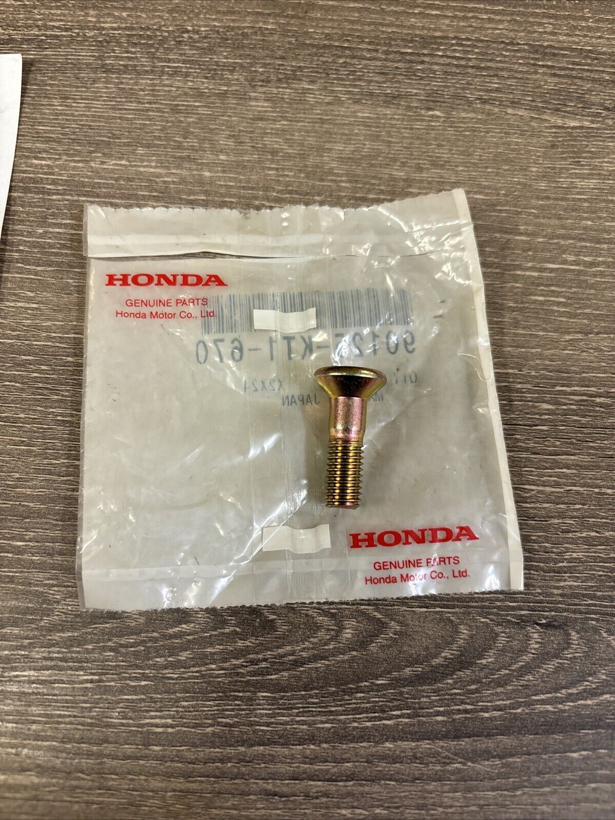 NOS Honda CR125R CR250R CR500R XR200R XR250R FLAT SCREW 8X29 90125-KT1-670 H136