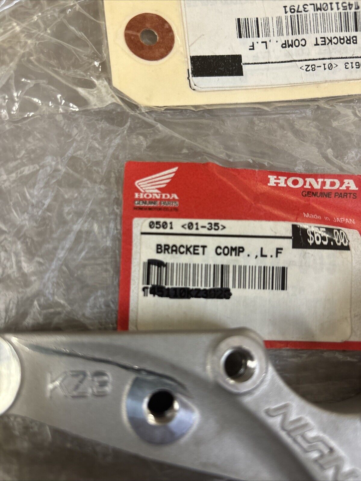 NOS Honda CR125R CR250R CR500R LEFT FRONT BRACKET 45110-KZ3-026 H120