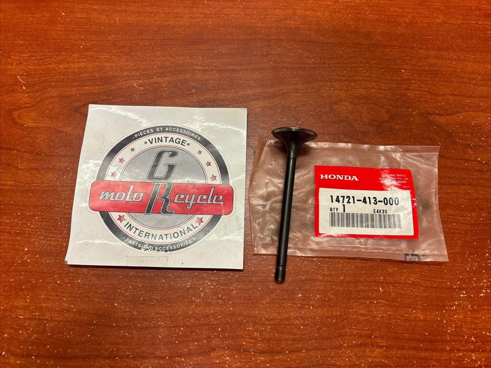NOS Honda CB400N CB400T CB450 CM400 CM450 EXHAUST VALVE 14721-413-000 H169