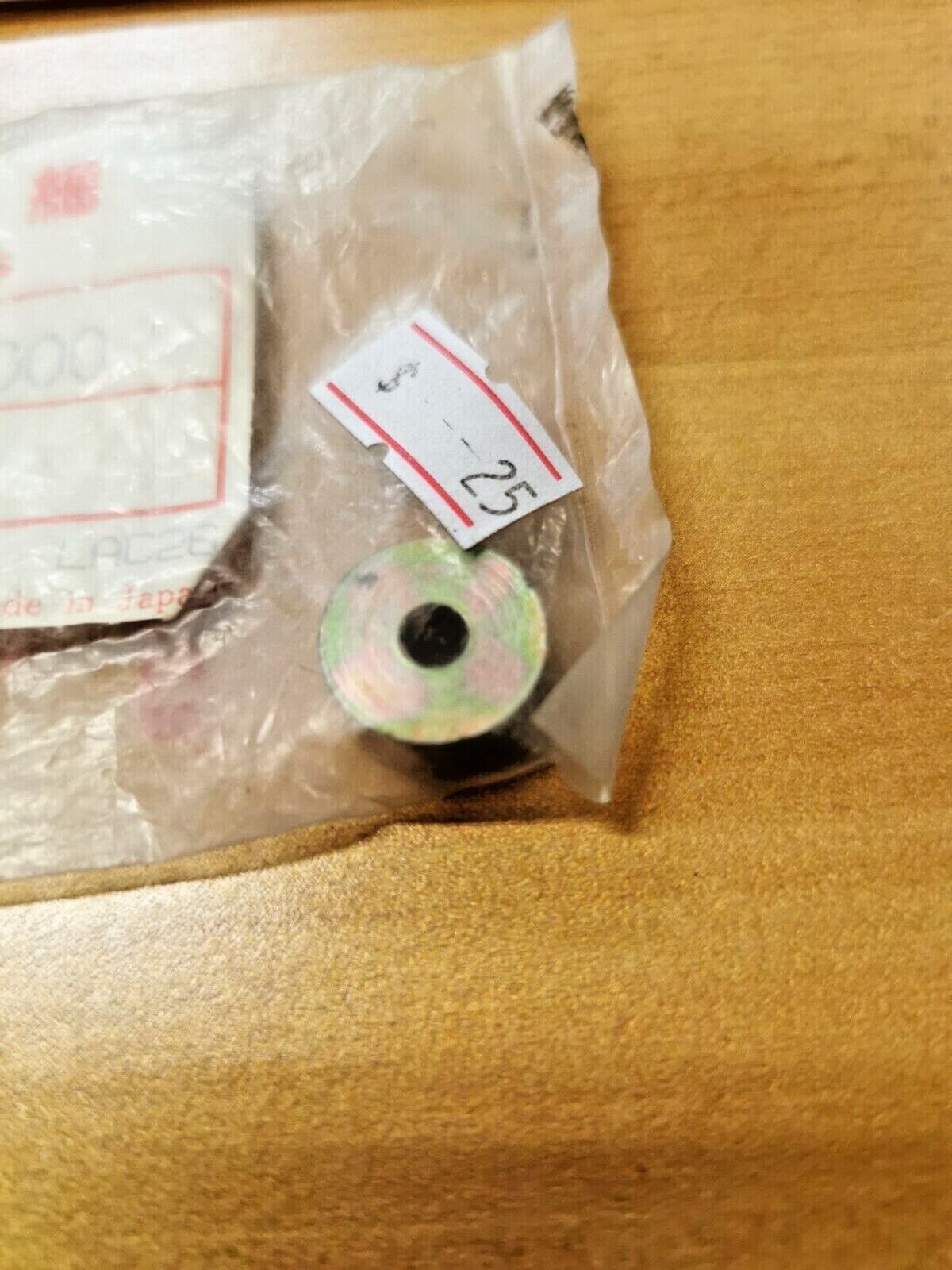 NOS HONDA TRX200 TRX125 1985  1986  COLLAR  TAILLIGHT    17207-VM6-000  H23