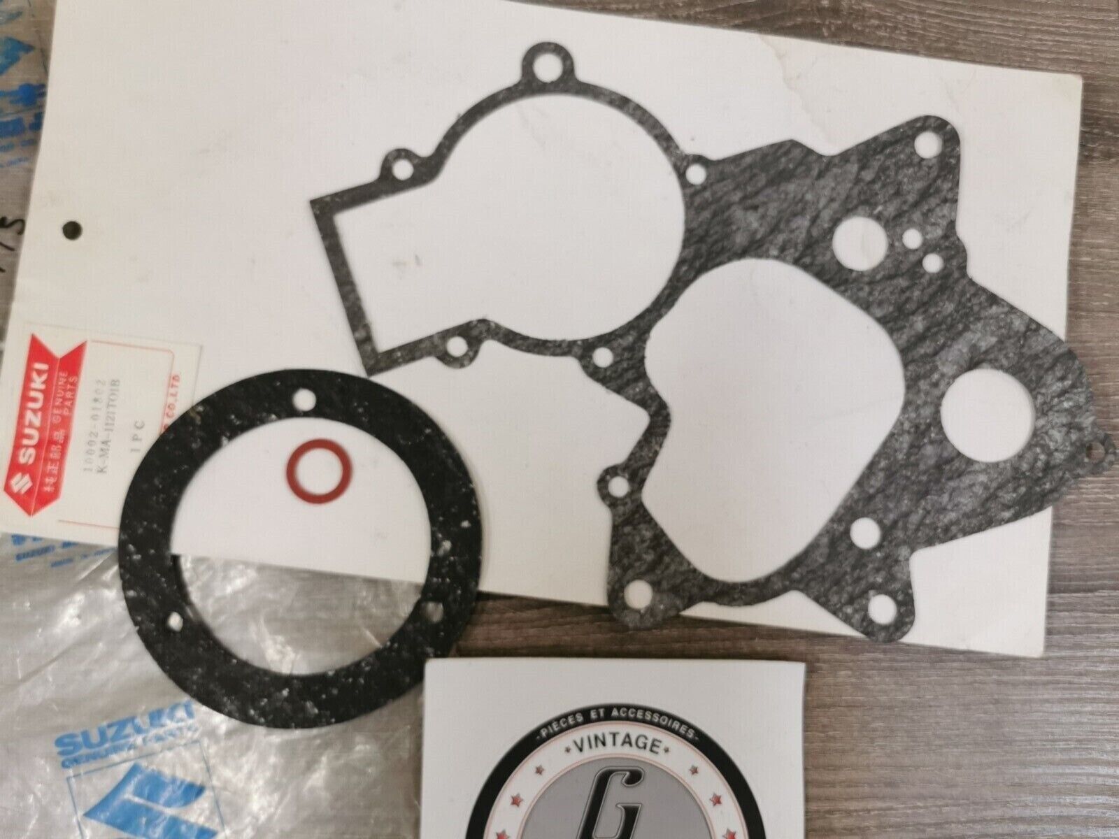 NOS SUZUKI M12 M15 1968 GASKET SET INCOMPLETE 10002-01802  S25