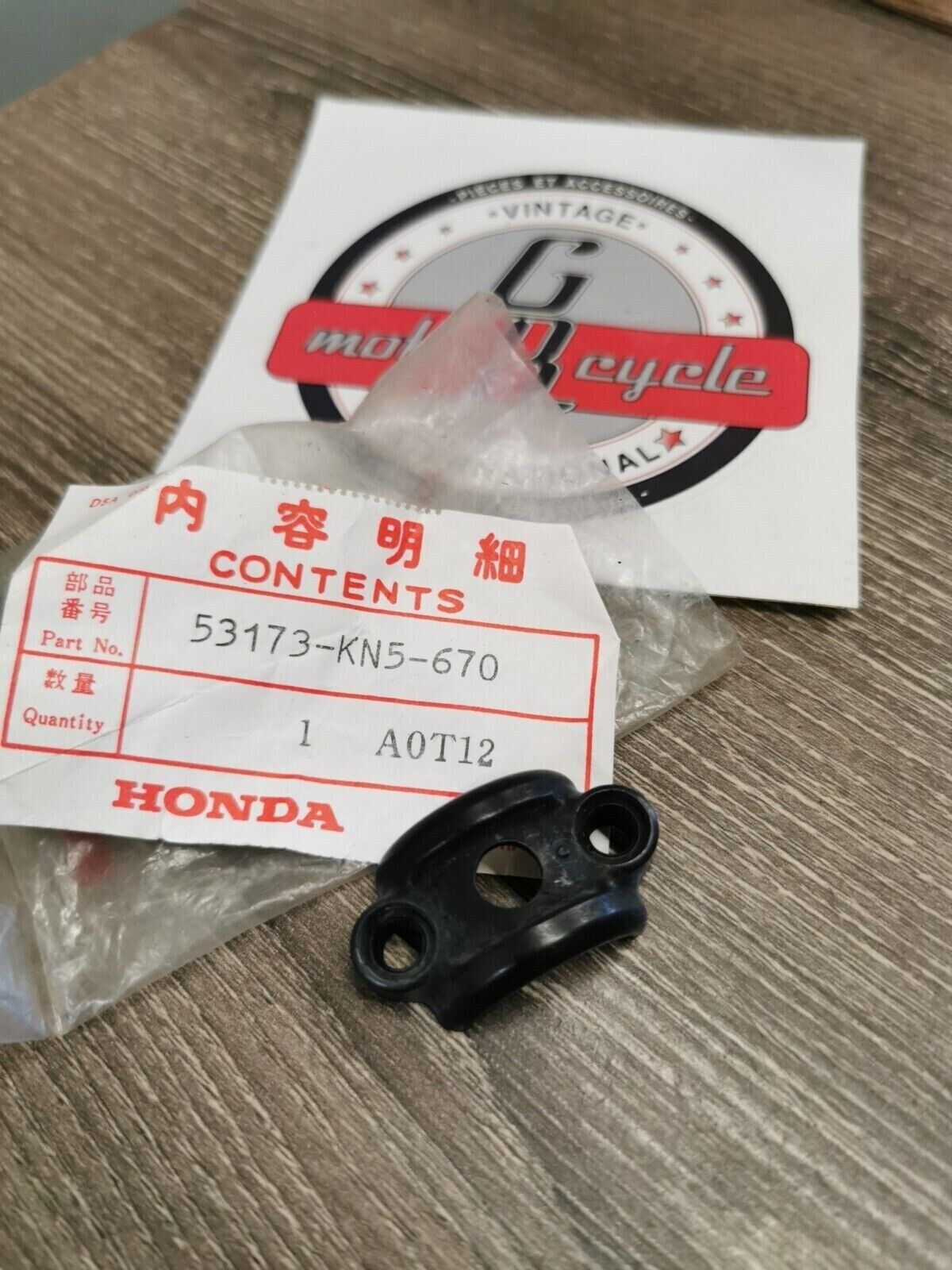 NOS HONDA HOLDER LEVER BRACKET 53173-KN5-670 H50