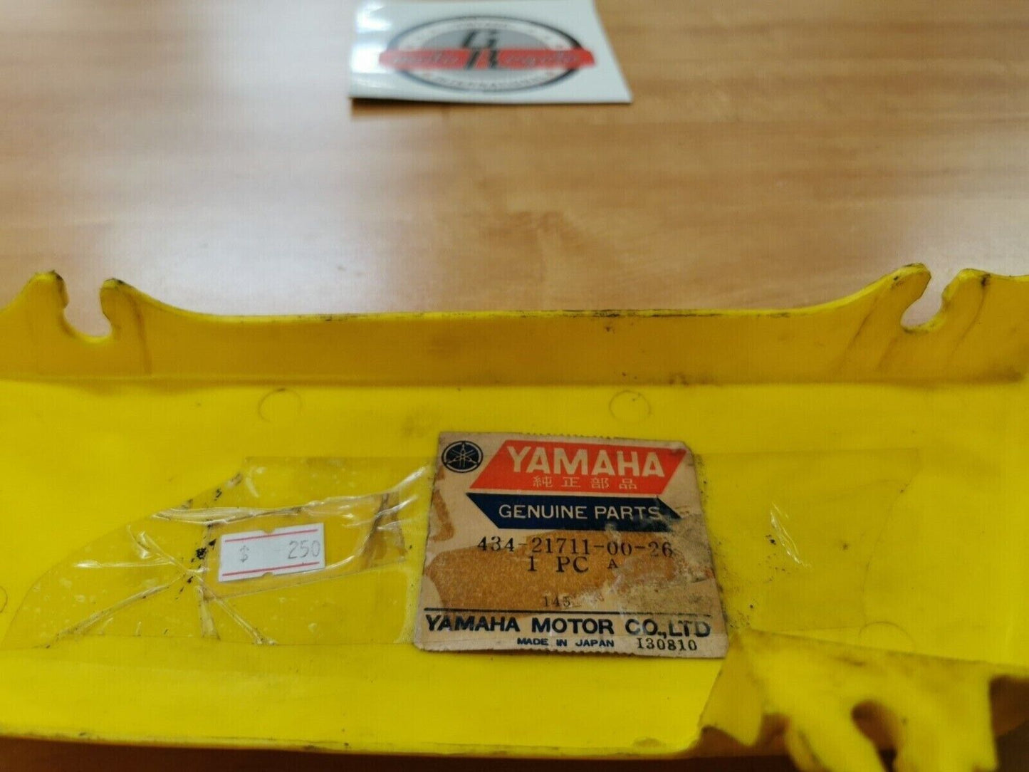 NOS YAMAHA TY250  1974  FRAME SIDE COVER 434-21711-00-26  Y42