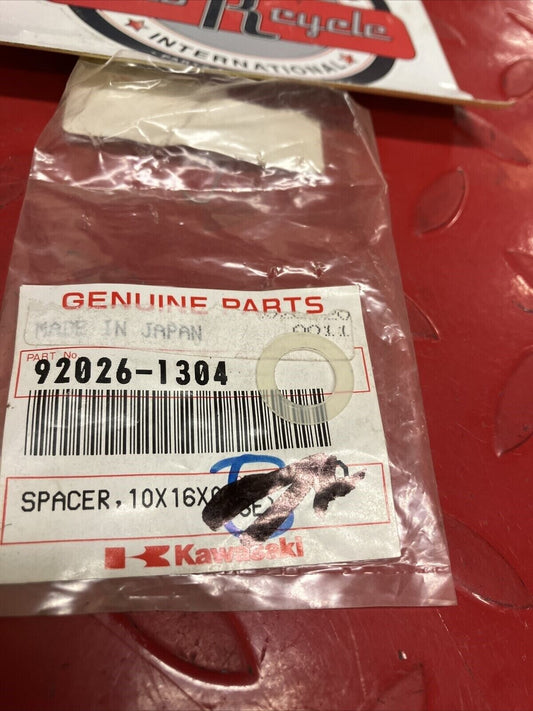 NOS KAWASAKI SPACER 10X16X0.8 92026-1304 K15