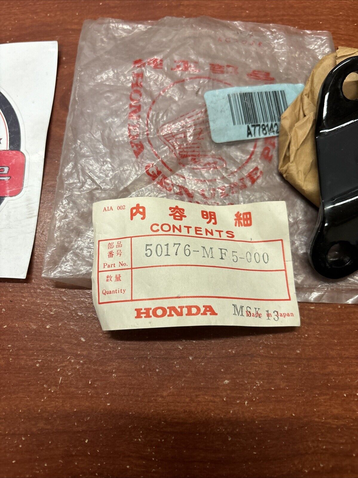 NOS Honda VT500C VT500FT LEFT FRONT ENGINE HANGER BRACKET 50176-MF5-000 H170