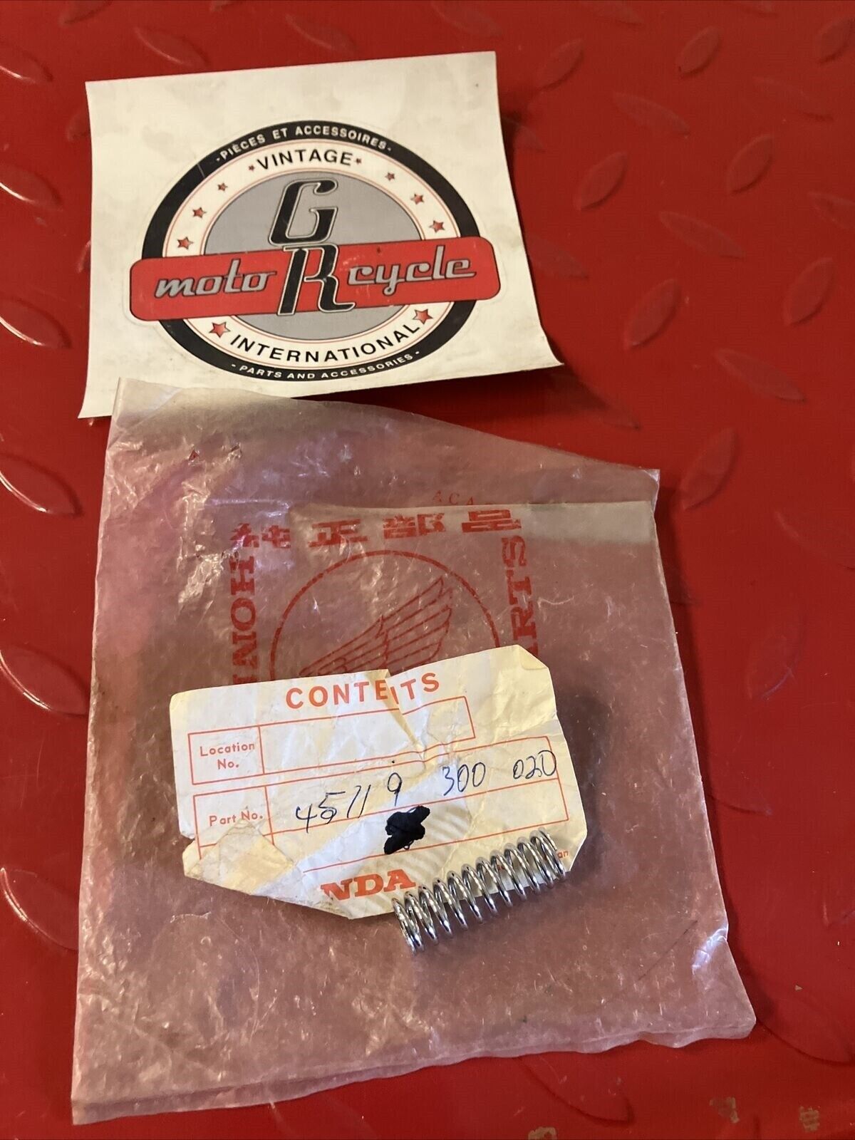 NOS HONDA CB450 CB500 CB550 CB750 CALIPER ADJUSTING SPRING 45119-300-020 H24