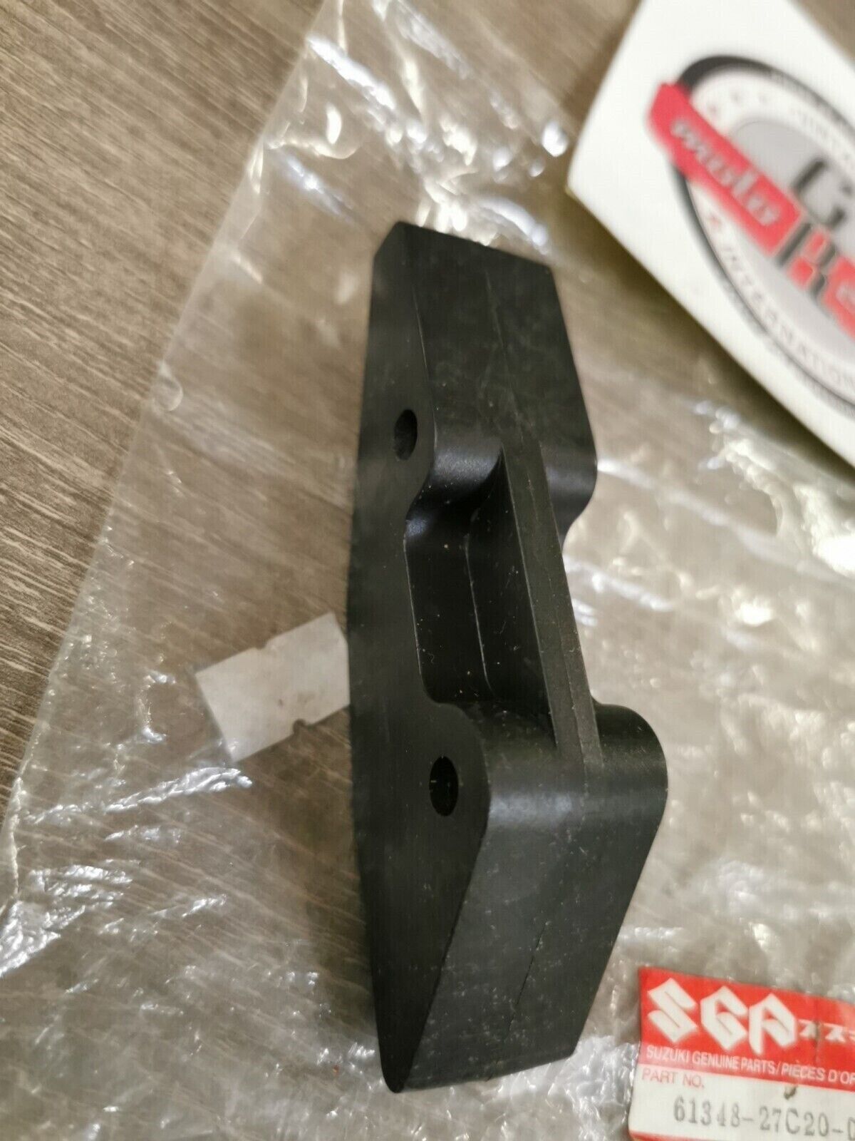 NOS SUZUKI RM125M RM250N RMX250T CHAIN GUIDE DEFENSE 61348-27C20 S23