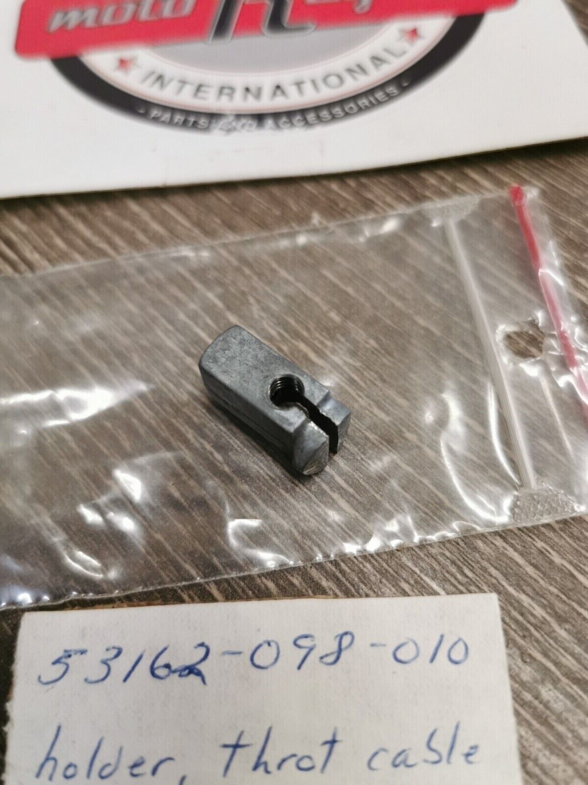 NOS HONDA HOLDER THROT CABLE 53162-098-010 H58