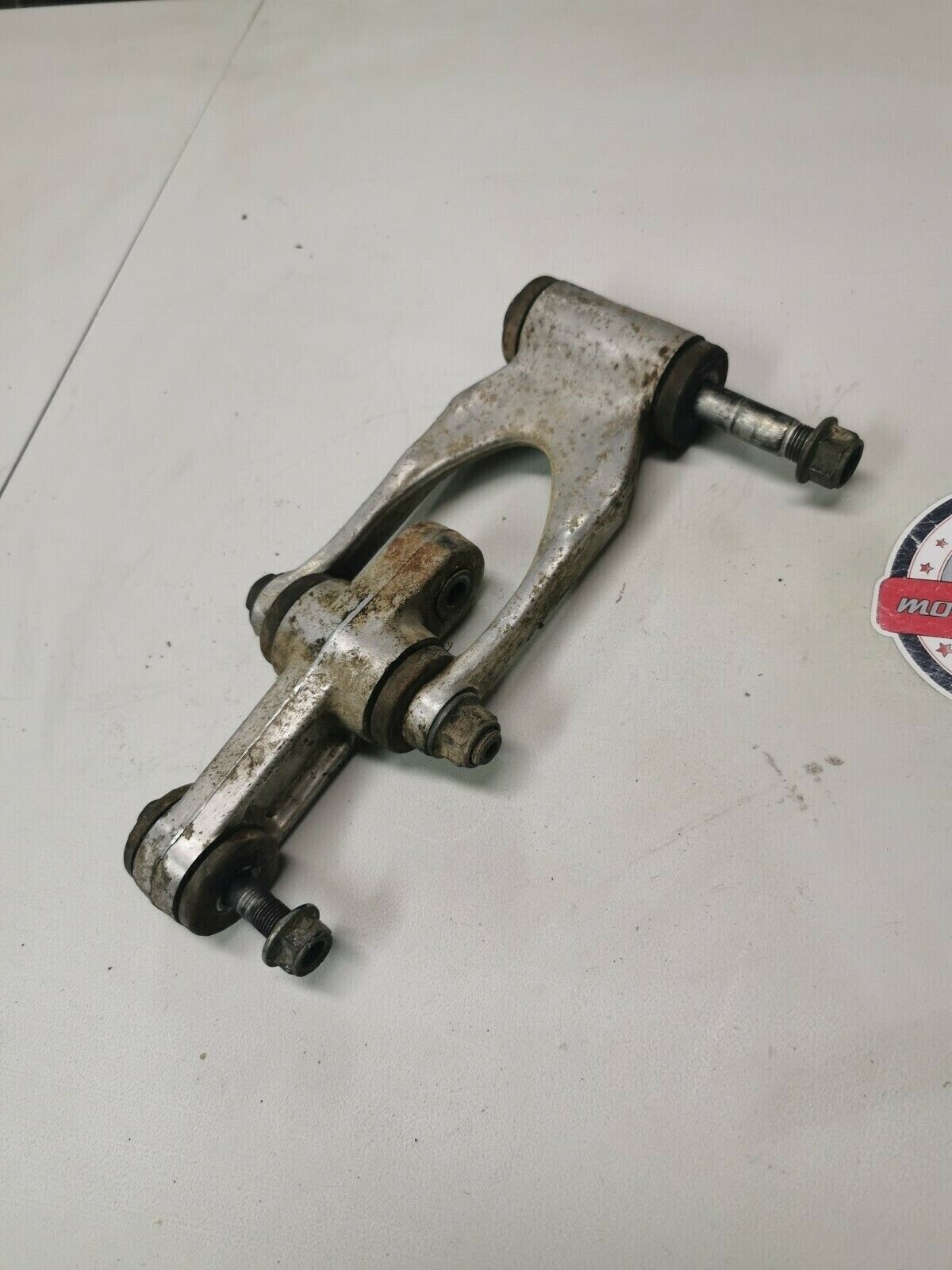 Suzuki RM125 1991 rear shock swingarm linkage dogbone cushion lever 62600-29810