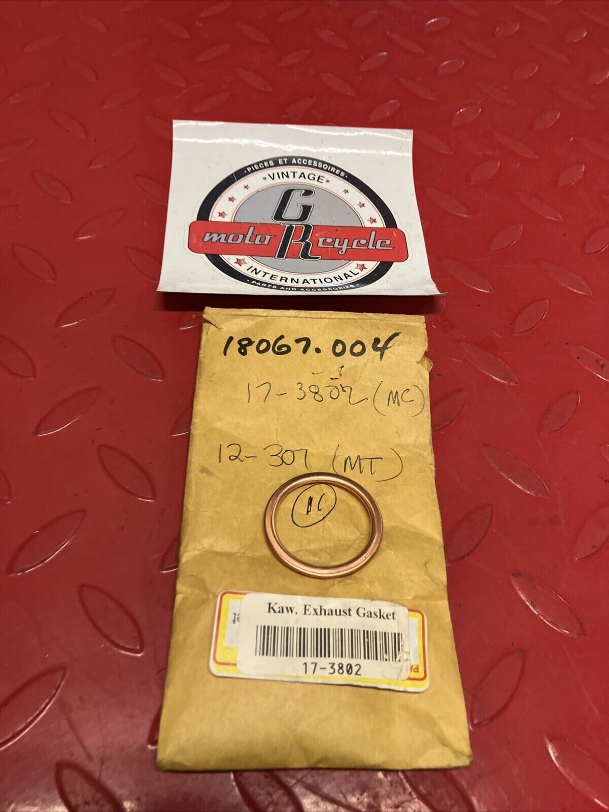 NOS KAWASAKI MC EXHAUST PIPE GASKET 18067-004 17-3802 12-307 K18